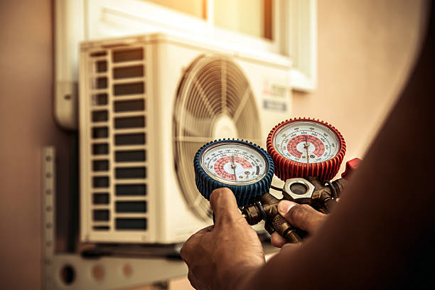 Professional Heat Pump Repair technician working in Palmersville, TN